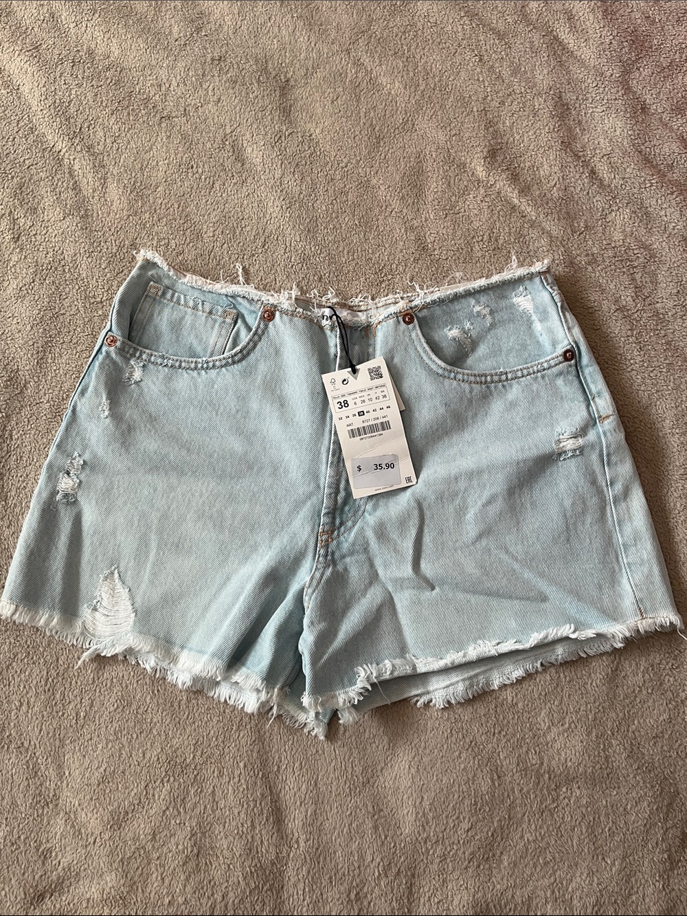 Zara Light Blue Distressed Denim Shorts